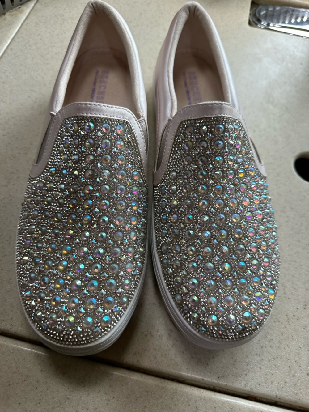 Skechers Slip-On Crystal Embellished Sneakers in Light Pink and Iridescent